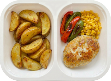 Homemade beef cutlet with roasted potato and veggie mix
