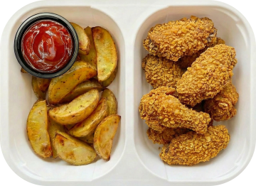 Spicy chicken wings with roasted potato and dip